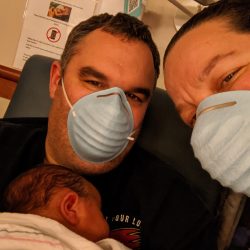 The Finne family at the hospital with their newborn, parents are wearing masks because it was the middle of the COVID-19 Pandemic